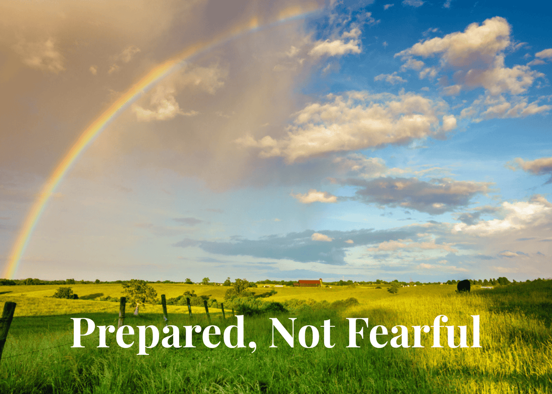 Rainbow over peaceful farmland representing faith-based preparedness and God's promise