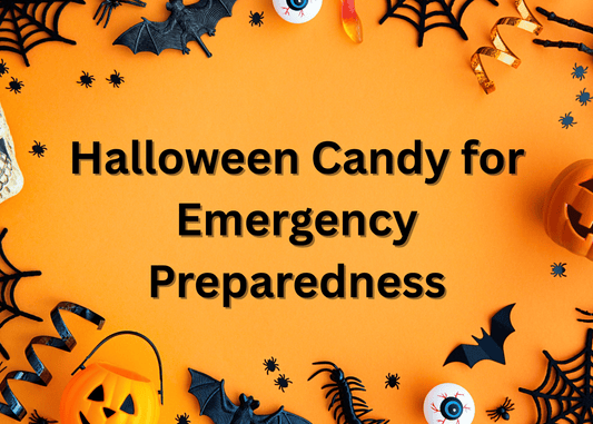 Halloween-themed flat lay with candy, bats, and pumpkins around the words ‘Halloween Candy for Emergency Preparedness."