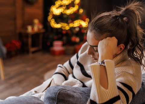 a sad woman during the holidays....the holidays are not the best days for many