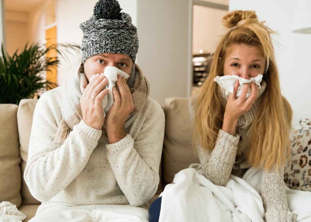 these two women have a head cold.  I hope they are not heading to the airport later today!