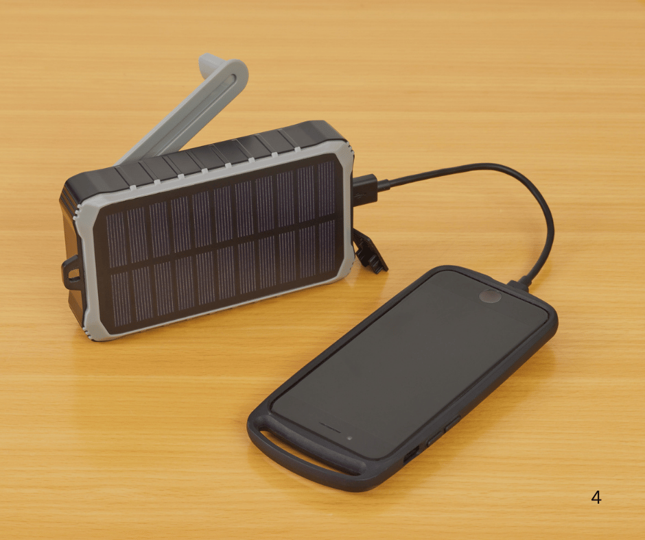 charging a phone with a hand-cranked ratio