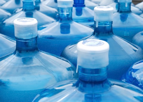 large water bottles next to each other
