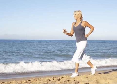 woman jogging on the beach