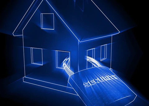 a dark blue background with a lighter blue background showing a house with a lock through several of the windows.  This house is safe!
