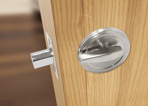 a door showing a deadbolt lock