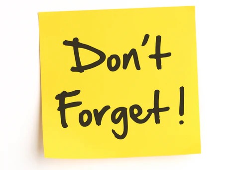 post it note that says don't forget