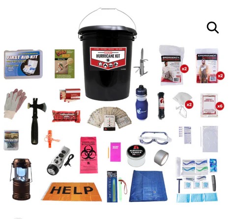 hurricane kit showing bucket and items inside it, like water, help sign, first aid