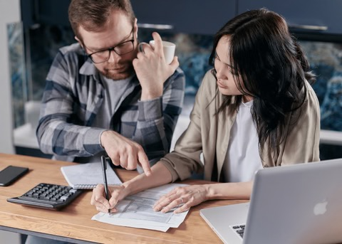 man and woman going over finances together